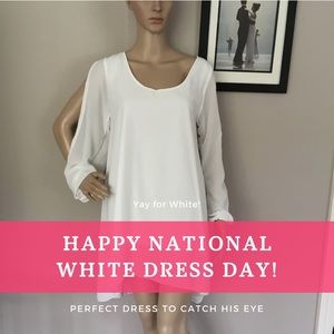 White short brand less dress in medium